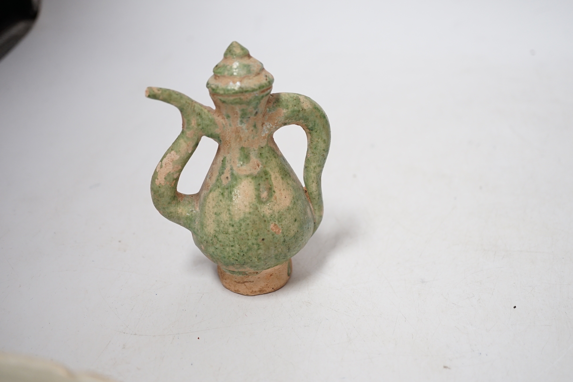 A Chinese incised Qingbai bowl, Song Dynasty and two green glazed Ming Dynasty pottery models of vessels, bowl 20cm diameter